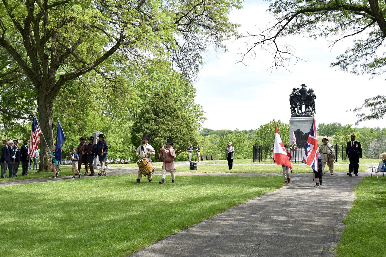 people leaving monument site